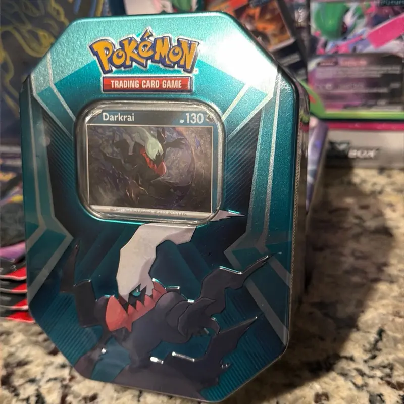 Pokemon TCG Triple Whammy Tin Darkrai - Includes Foil Card & 3 Booster Packs - Features Larvitar Pupitar Tyranitar Sableye Spiritomb & Slakoth Vigoroth Slaking - Perfect for Collectors - TikTok Shop Pokemon TCG Triple Whammy Tin Darkrai - Includes Foil Card & 3 Booster Packs - Features Larvitar Pupitar Tyranitar Sableye Spiritomb & Slakoth Vigoroth Slaking - Perfect for Collectors - TikTok Shop