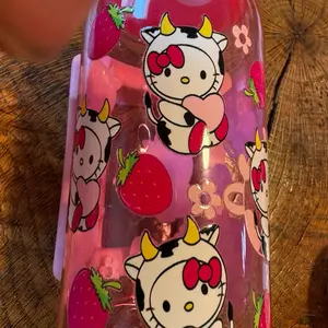 Hello kitty cow print costume with strawberry
