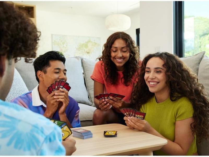 Mattel Games UNO Show 'em No Mercy Card Game for Kids Adults & Family Parties Travel with Extra Cards Special Rules & Tougher Penalties