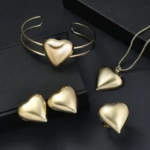 4 Piece Set -Earrings, Necklace 17 Inches, Bangle Bracelet, Ring Adjustable in Goldtone