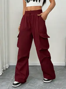 Women’s cargo pants with an elastic waistband and drawstring, loose fit with multiple pockets; wide-leg design that’s versatile for street style, casual wear, travel, and office commuting.
