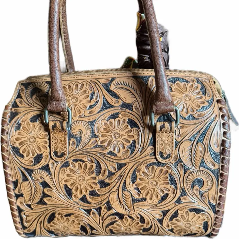 Medium Hand tooled brown leather speedy bag