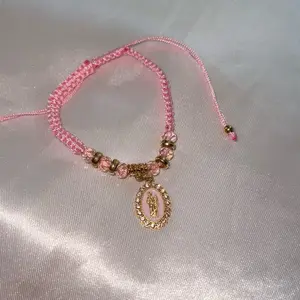 Pink And Gold San Judas Thread Bracelett