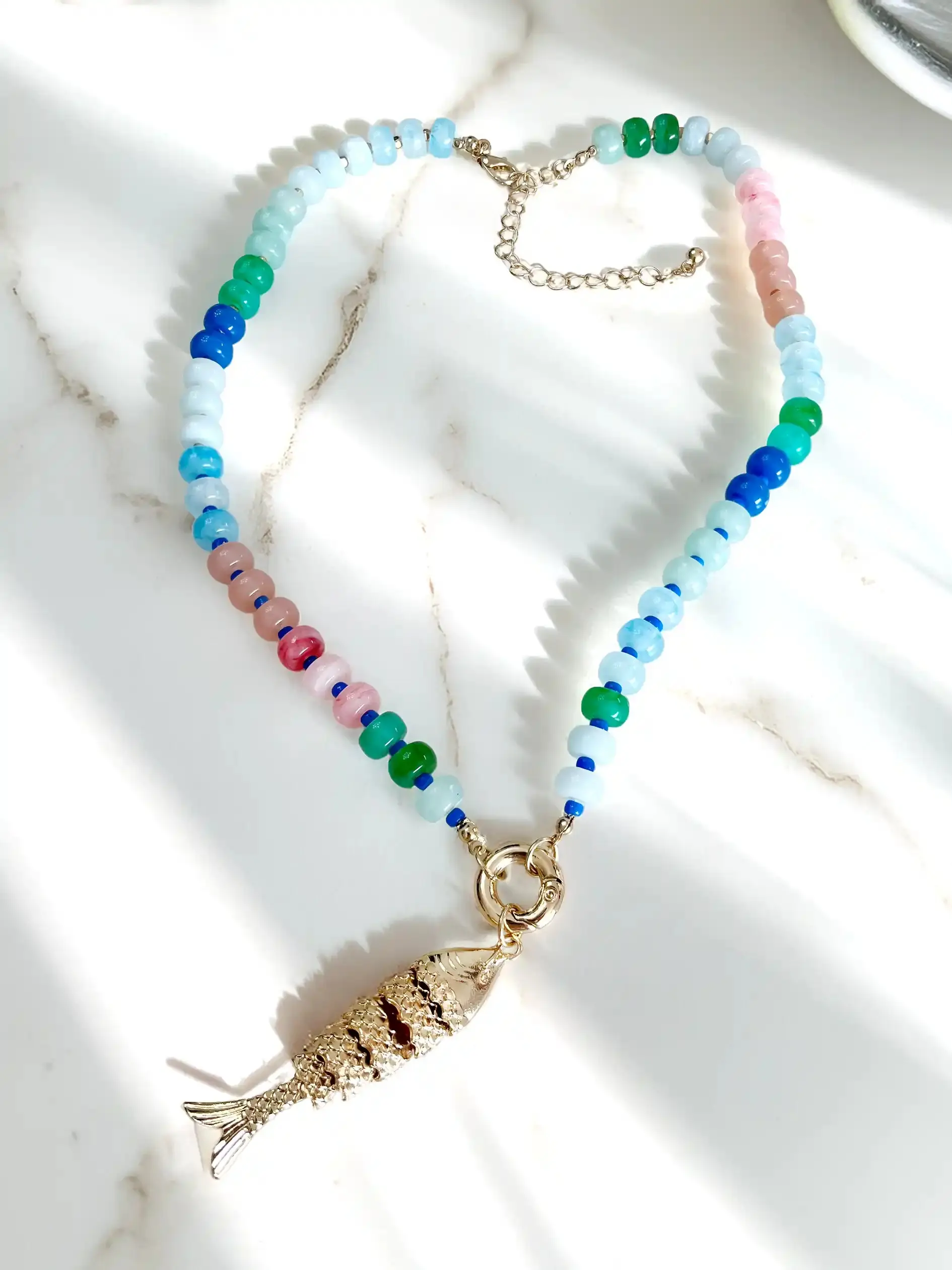 Colorful Glass Beaded Necklace with Gold Articulated Fish Charm