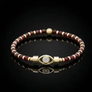 Women’s Protection & Power Red Pyrope Garnet Wristband with Evil Eye CZ Charm and Gold