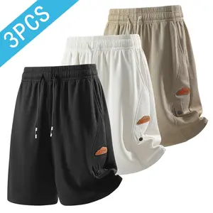 Men’s solid color spliced drawstring waist shorts; loose fit casual shorts with pockets and an elastic waistband; men’s summer everyday bottoms; casual athletic shorts; fashionable summer shorts.