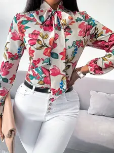 One women's colorful floral bow tie-dye loose woven blouse shirts with long sleeves, suitable for vacation, commuting and daily wear.