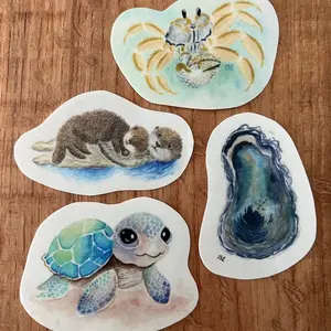 Watercolor stickers - baby turtle, mother and baby otters, ghost crab, and colorful oyster featuring original artwork