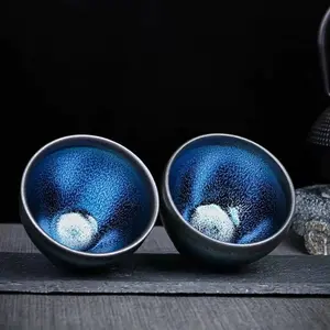 Handcrafted Ocean-Blue "Hare's Fur" Jianzhan Teacup — Iridescent, Flowing Glaze — Authentic Chinese Artisan Teaware — Collectible-Grade Handmade Cup with Kiln-Fired Variegated Glaze — Traditional Jianzhan