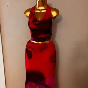 Elegant Red Halter Maxi Dress with Gold Waistband for Special Occasions