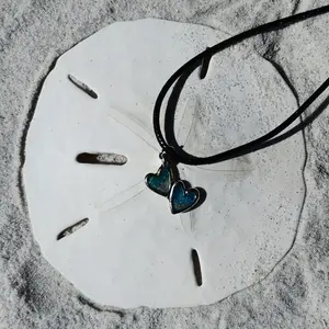 Leather cord necklace w/ charm