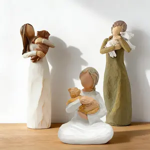 Heartwarming and touching resin statue of a woman and her pet - a lovely home decor ornament for pet lovers, a thoughtful gift for animal enthusiasts, and a decorative home sculpture.