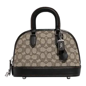 COACH Revel 24 Classic Monogram Jacquard and Glove-Tanned Leather Crossbody Bag for Women, Medium, Gray-Brown and Black