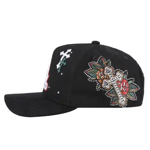 Polyester Hat - Oversized LA Lettering Front, Scattered Embroidered Crosses, Rhinestone-Accented Side Floral Cross Patches, Bold Heritage-Style Streetwear Statement Piece Classic Black Hat, Rhinestone Hats, Cross Print Hats