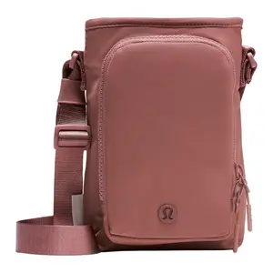 Lululemon Women's 2L Water Bottle Crossbody Bag with Front Pocket, Adjustable Strap, Recycled Nylon, Smoky Pink