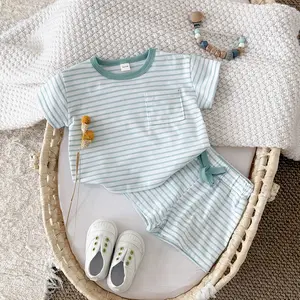 Two-Piece Summer Minimalist Versatile Baby Set with Pocket Design – Loose Short-Sleeve Top + Breathable Athletic Shorts for Comfortable Wear