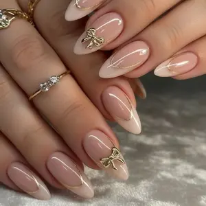 Gold Accent French Tip 3D Gold Bow Medium Almond Press On Nails – 24 pcs Fake Nails, Kit with Jelly Glue & File, Elegant & Minimal Nails for Everyday Wear
