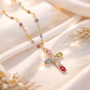 a delicate, colorful faith cross necklace made for women and girls, set with sparkling cubic zirconia.this shiny crystal cross pendant adds a pop of color and sparkle to your everyday outfits, and it’s perfect for daily wear or as a beautiful gift.