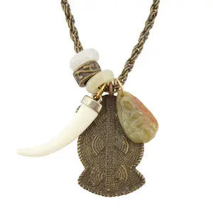 Antique brass pendant with jade spacers and jade buddha charm horn dangly bohemian necklace