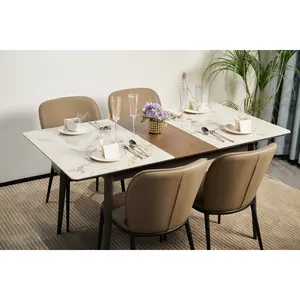 The rock plate can be extended to form a dining table for 6 to 8 people, a kitchen and a living room. It can be quickly assembled. The materials are rock plate and metal base