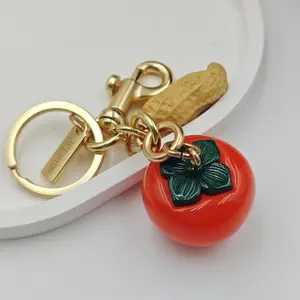 {Keychain} A persimmon peanut keychain symbolizing good things happening - Everything goes well, bag pendant - Valentine's Day gift