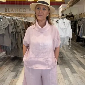 One size fits XS to XL 100 percent linen Aime top relaxed fit with high collar short sleeve side slit breathable summer elegant everyday piece multiple colors available