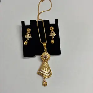Gold Plated Pendant Set with AD and Ruby Colored Stone comes with the chain
