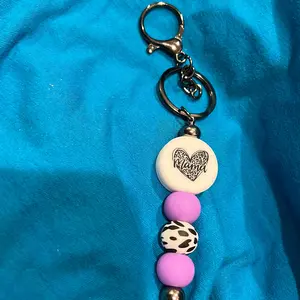 Purple leopard mama keychain