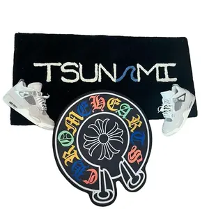 Tsunami Rainbow Chrome Rug with Colorful Text Design and Central Emblem Pattern