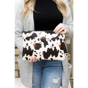 Aili's Corner Cow Print Oversized Everyday Clutch