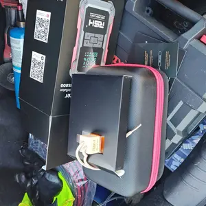 15000mAh Ultra-Safe Jump Starter – Starts all 12V battery vehicles. Features 150 PSI air compressor, 45W fast charging, tire pressure check, and LED light. Includes jumper cables, air hose, storage bag, and 4-in-1 charging cable