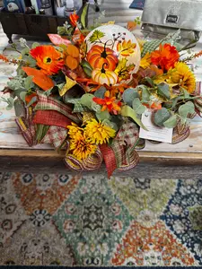 Handmade Pumpkin Glow Fall Centerpiece with crackle-glass pumpkin globe, sunflowers, mums, eucalyptus &amp; plaid ribbons. Perfect for tables, mantels &amp; fall gatherings.