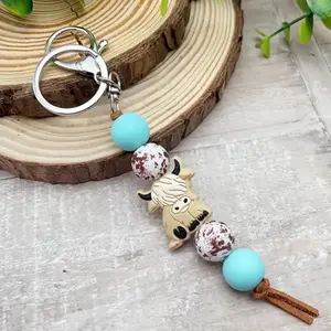 Highland cow beaded keychain