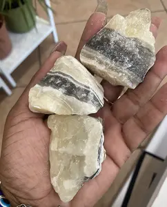 Zebra Calcite - Natural Mineral with White and Gray Sections, Handheld in a Clear Packaging