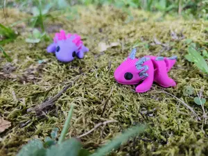2 mini 3D printed Axolotl  pocket pets pink and purple