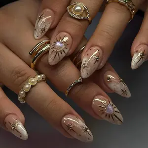 Luxury Nude Gold Almond Nails | Shimmer Gold & Star Fake Nails | Elegant Astrology Nail Art | Ethereal Sun Short Press On Nails | DC178Y
