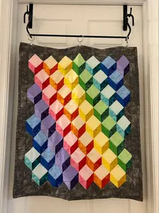 The Quilt Keeper - Over-door quilt display.