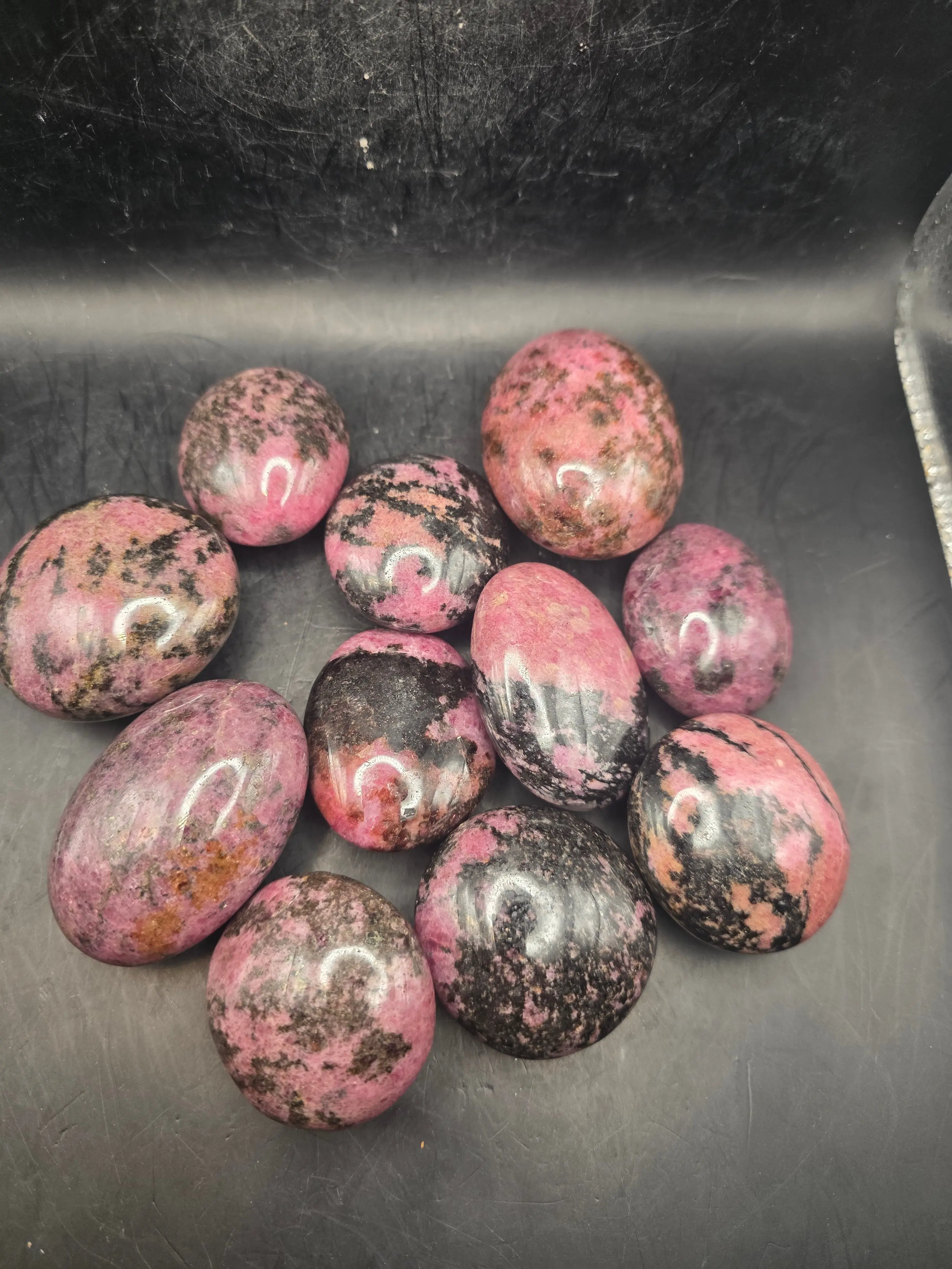 Rhodonite palm stone! 1.6 too 2.2 inches! Rhodonite palm stone! 1.6 too 2.2 inches!