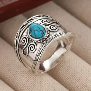 Vintage ethnic style silver jewelry wide ring with oval main stone winding branches and curled grass patterns