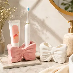 Resin Countertop Toothbrush Holder - Bowknot Design Bathroom Organizer, Stylish Home Accessory for Vanity, Modern Storage Rack for Toothbrushes, Toothpaste, Makeup Brushes, Countertop Toothbrush Holders