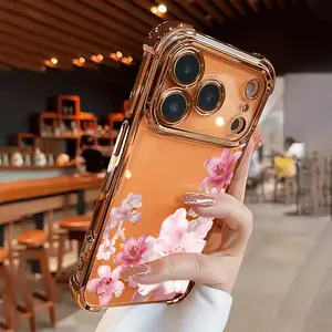 This pink peach blossom and lily pattern TPU full-coverage phone case features four drop-proof and non-slip corners, and is compatible with iPhone 17, 16, 15, 14, 13, 12, 11, XS, X series, and other models. It makes a great gift for friends or family.