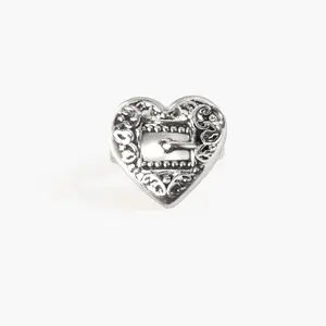 en route Belted Heart Ring in Silver, Bold Heart Motif with Central Buckle & Baroque Swirls, Faceted Organic Band for Powerful Self-Love Style, Statement Jewelry That Protects and Celebrates Your Heart