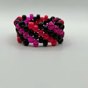 Kandi Black and Hot Pink Swirl Cuff - Stylish Design for Versatile Wear