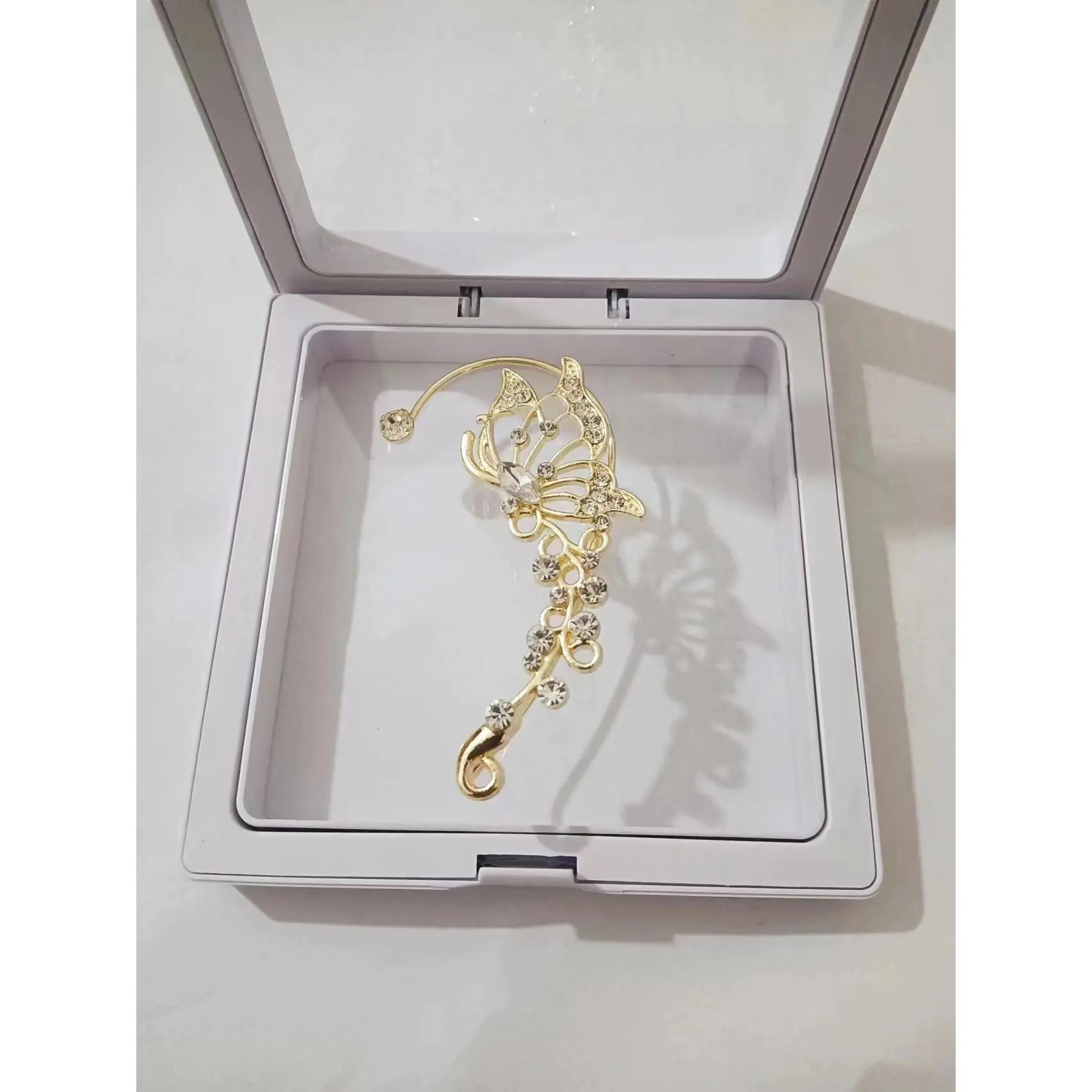 Zircon butterfly golden left ear