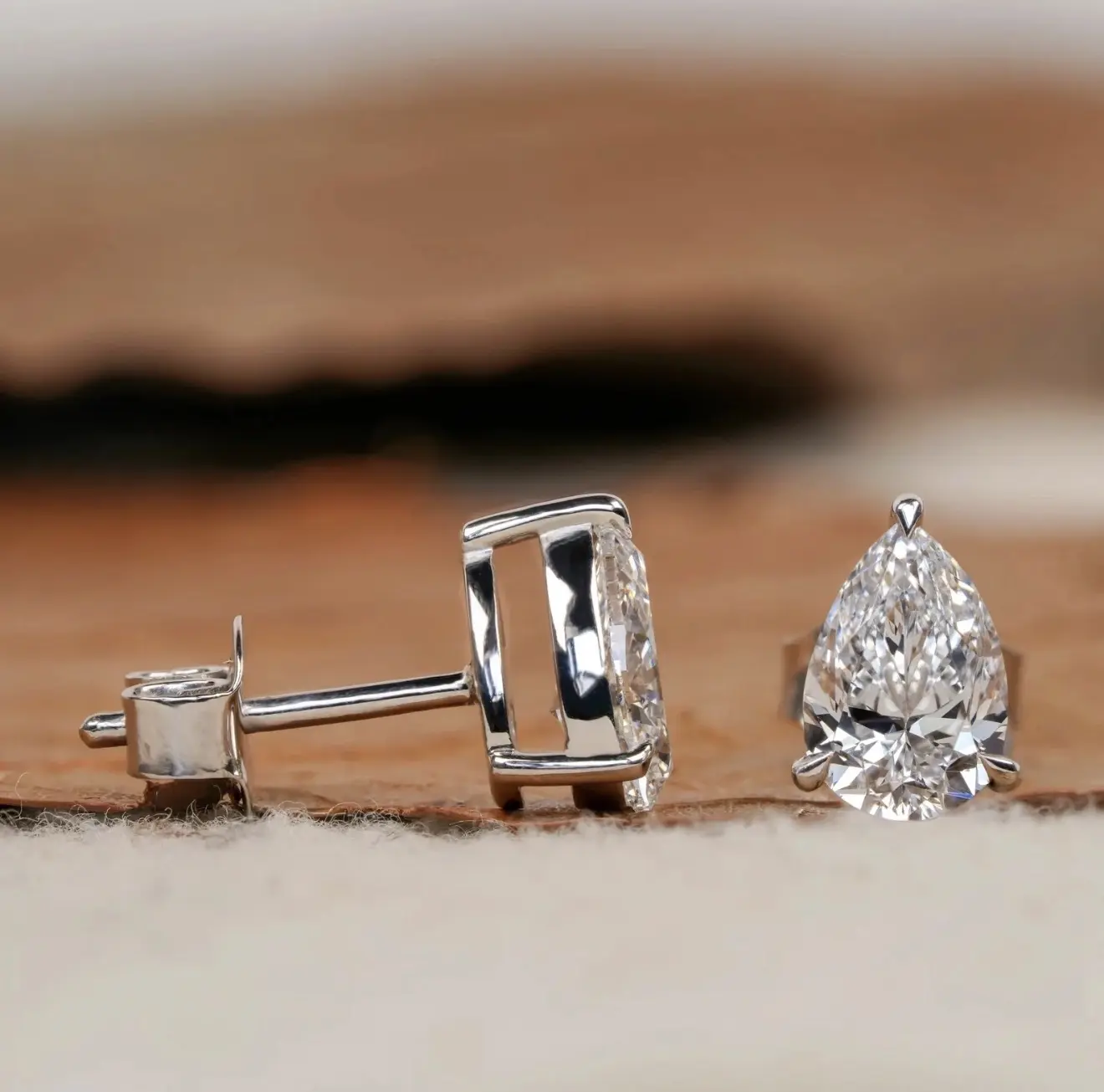 Custom setting Elegant Pear-Shaped Diamond Stud Earrings 14K wite