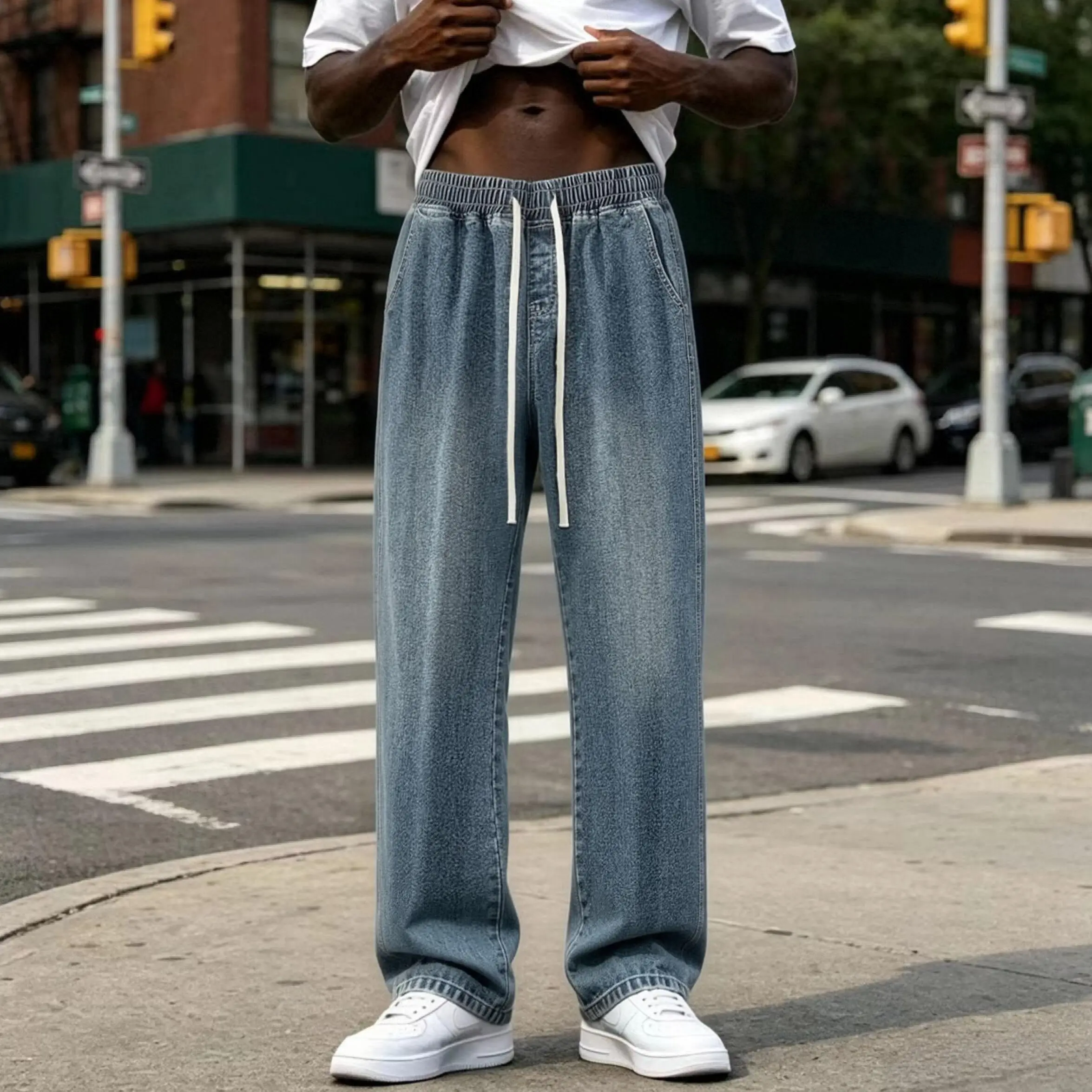 Summer lightweight American retro high-street men’s jeans — washed distressed finish, stylish and versatile solid color, minimalist loose straight cut, casual commuter style, drawstring tie detail, basic design, available in multiple colors