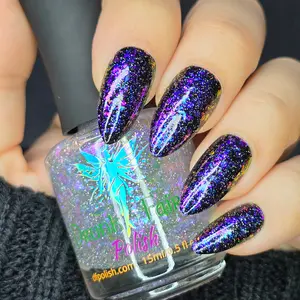 Crystal Galaxy Nail Polish by Drunk Fairy Polish | An Irregular Aurora Flaky Topper in a Clear Base That Goes From Purple to Blue to Red to Gold and Green at the Extremes. Contains Tiny Silver Holo Reflective Glitter