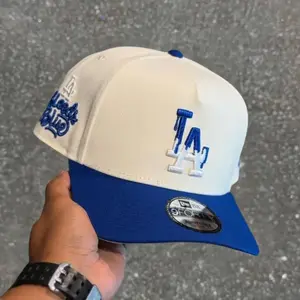 New Era Los Angeles Dodgers Drip Paint Streetwear Baseball Cap – Adjustable LA Hat with Embroidered LA Logo and Blue Dripping Brim Design, Hip Hop Urban Baseball Cap for Men Women Casual Outfit Sports Fashion Hat