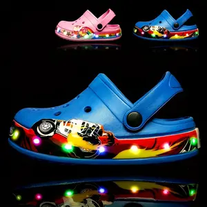 Youngsters' Glow-in-the-Dark Clogs Cute Cartoon LED Light-Up Sandals for Boys & Girls Non-Slip Soft Sole EVA Material Perfect for Indoor Outdoor Play Beach and Summer Fun
