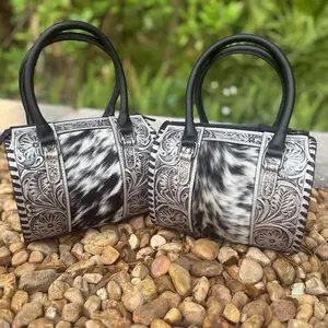 Small silver and cowhide tooled leather speedy purses with removable cross body strap